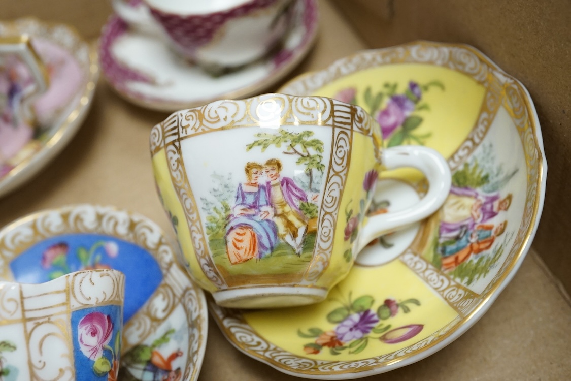 A group of 19th/20th century German porcelain, comprising a Nymphenburg pug, seven Dresden miniature cups and saucers and a Meissen bottle, largest 13cm high